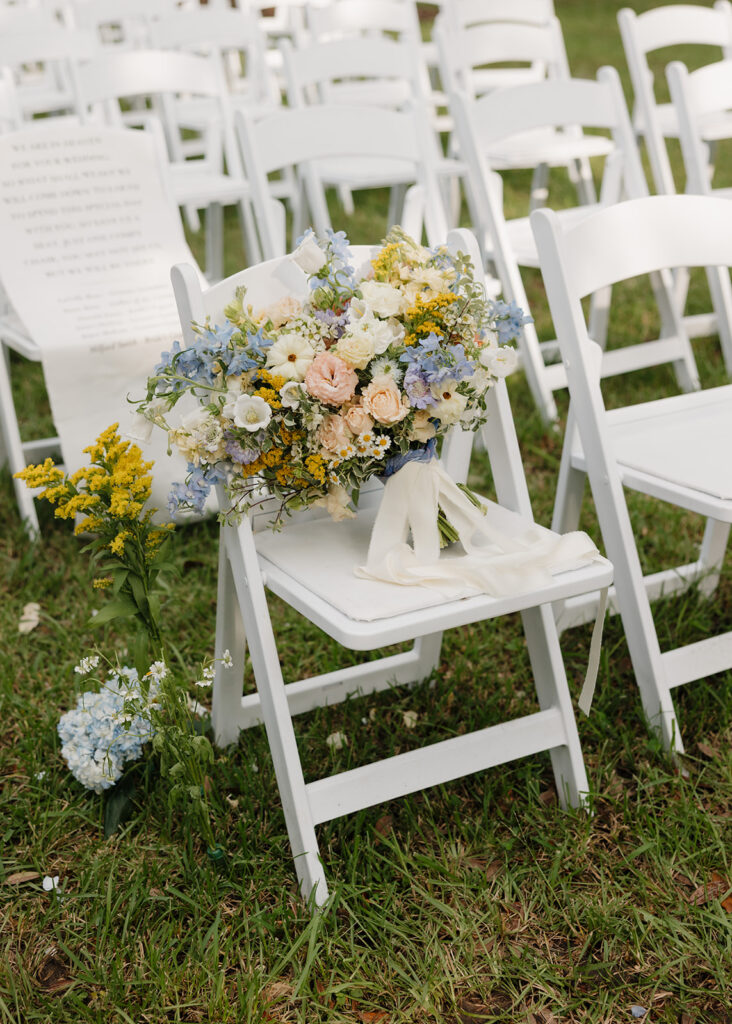 floral bouquet rests on chair