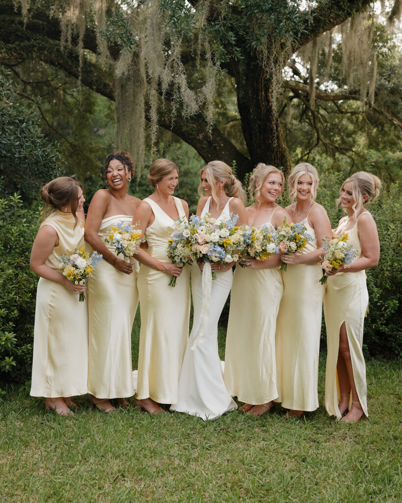 bride and bridesmaids laugh