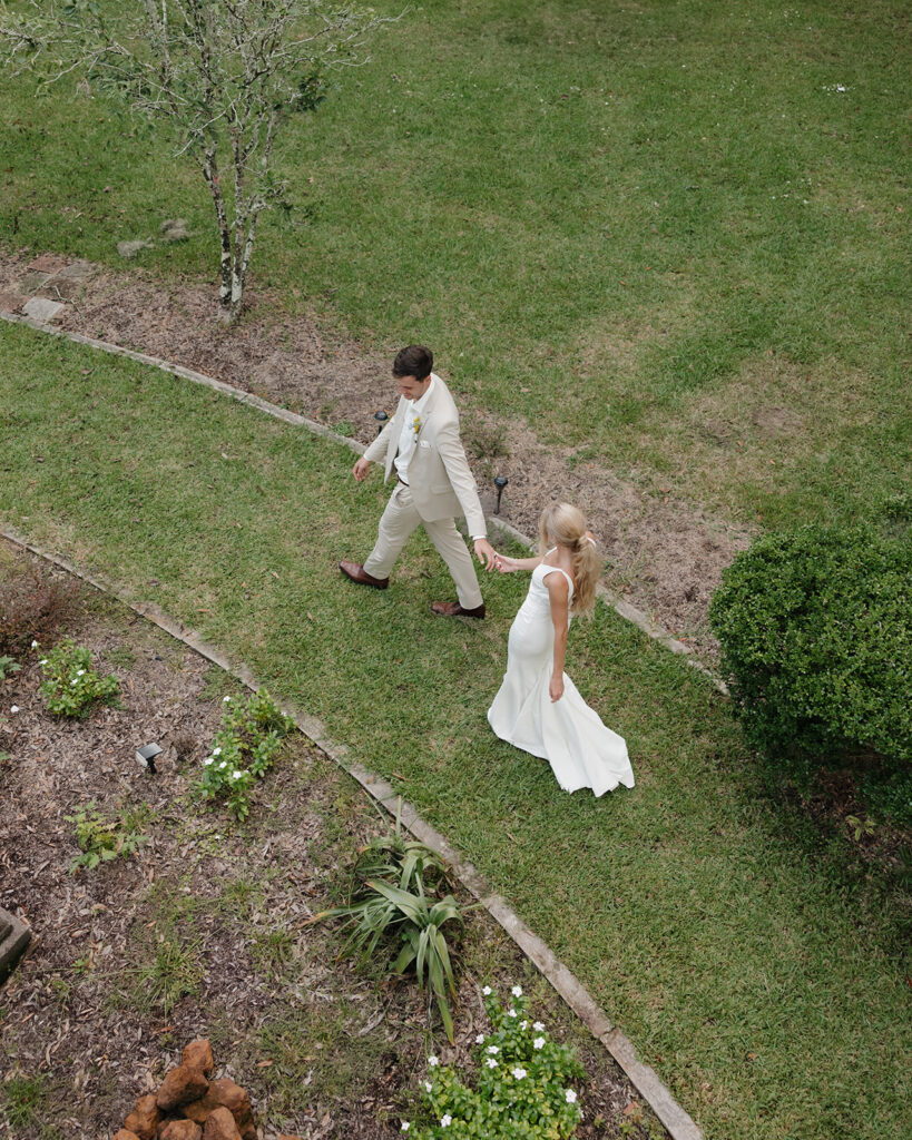 bride and groom walk