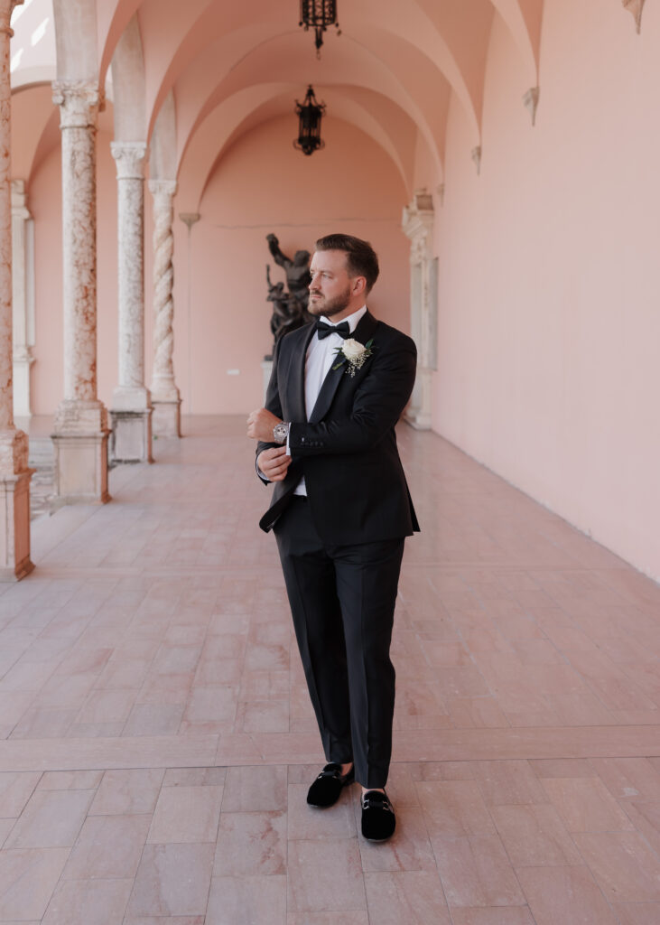 Groom adjusts his watch