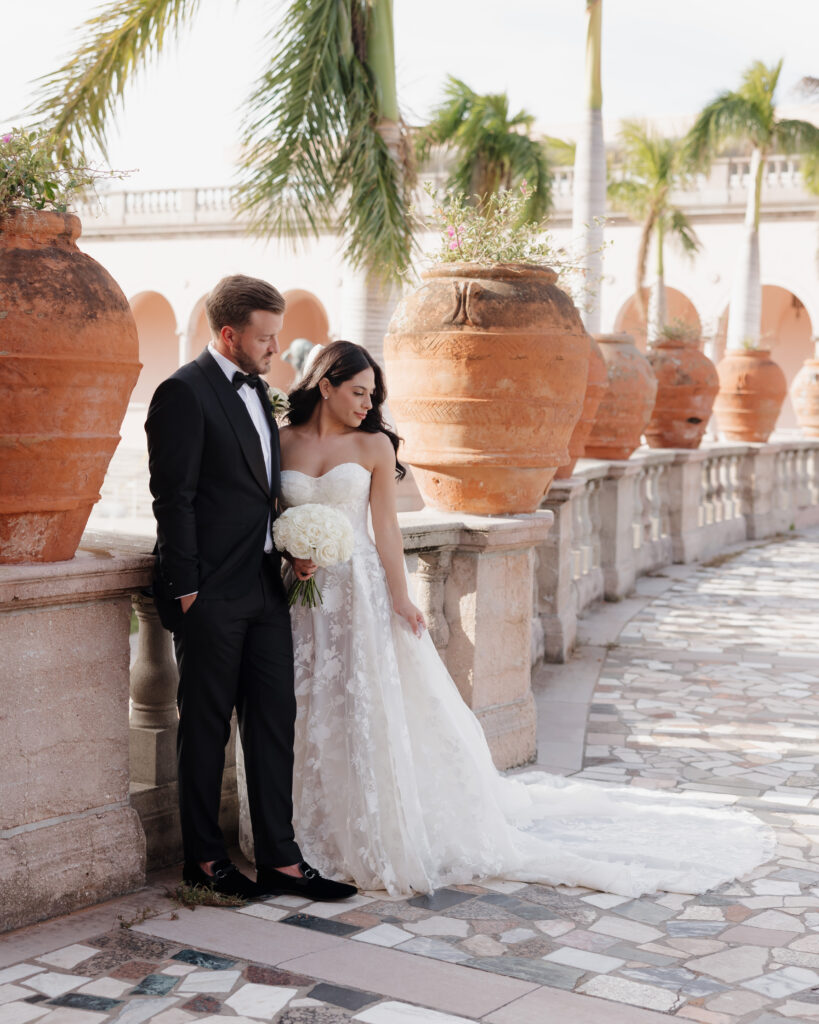 bride and groom admire the dress