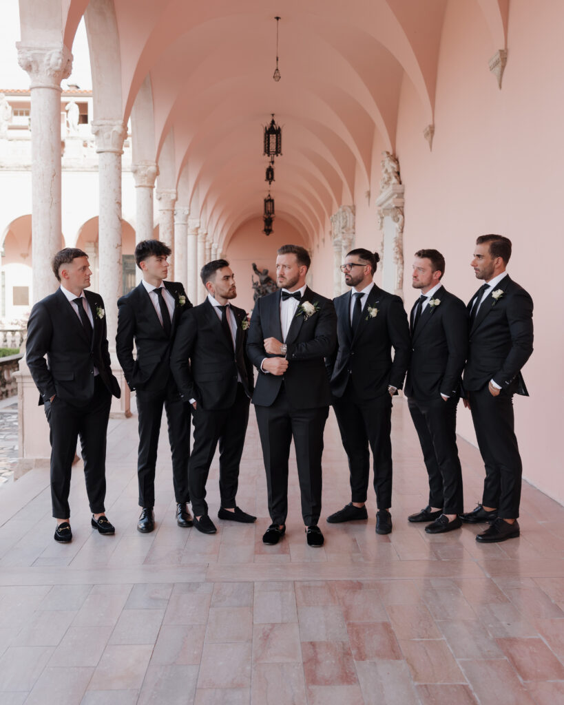 groom and groomsmen pose