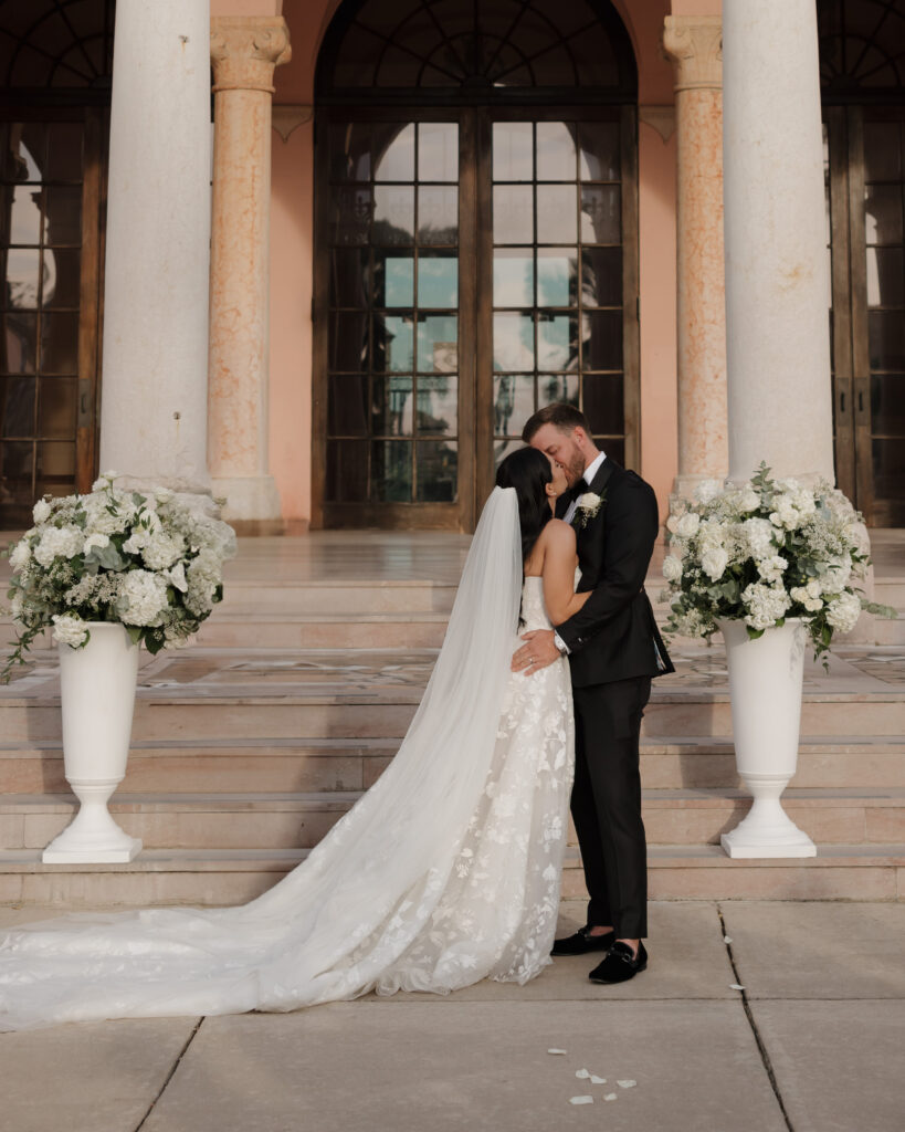 bride and groom kiss