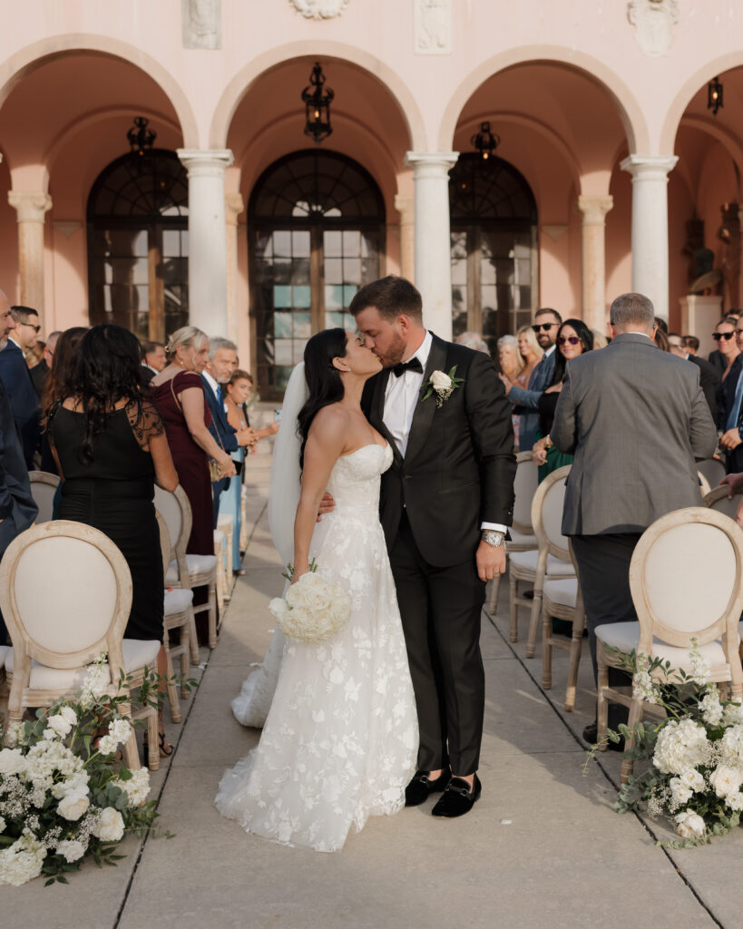 bride and groom kiss