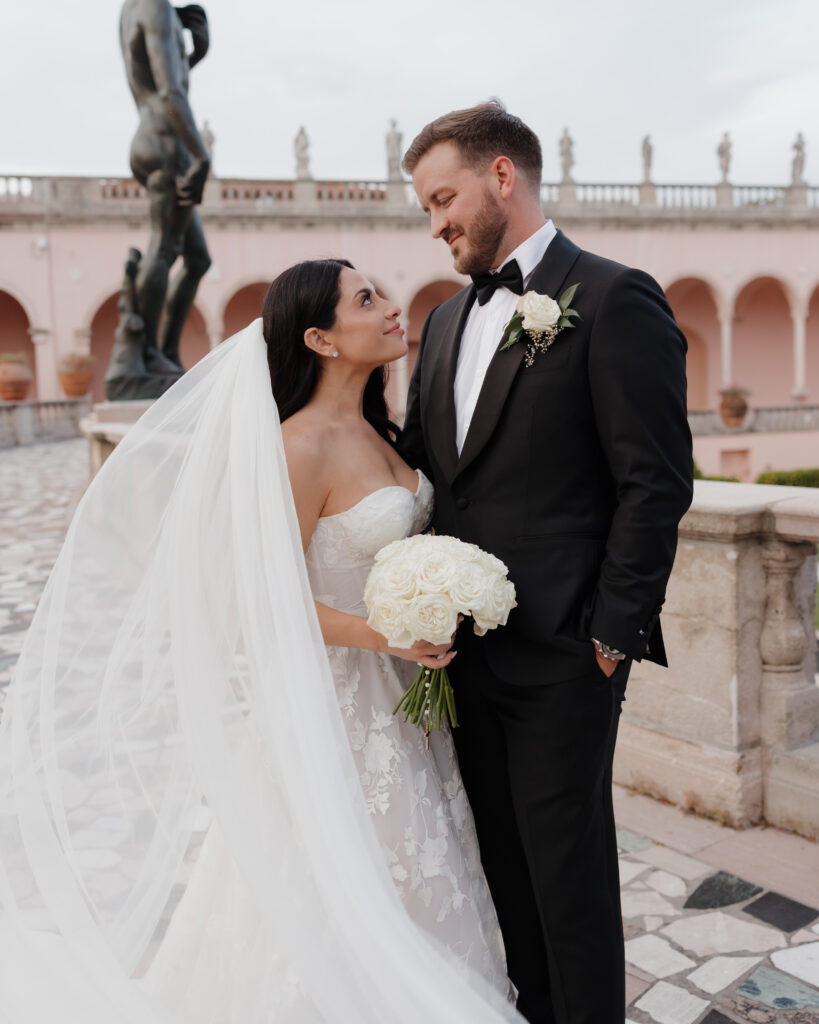 bride and groom smile