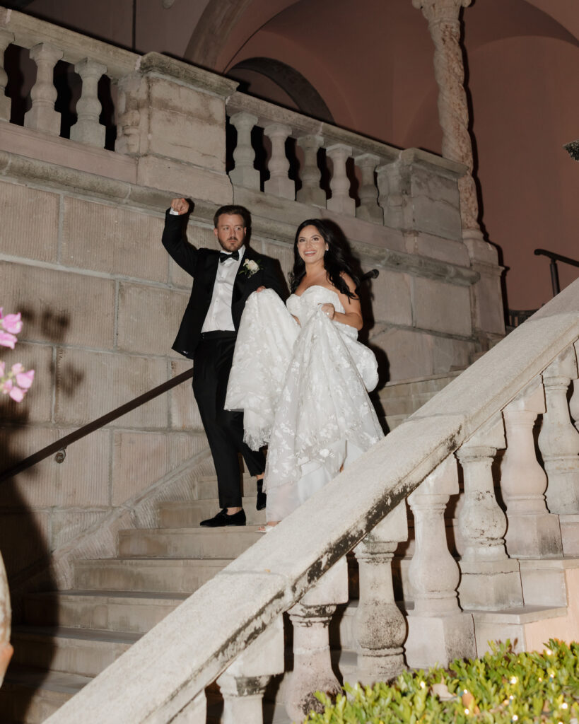 bride and groom dance into reception