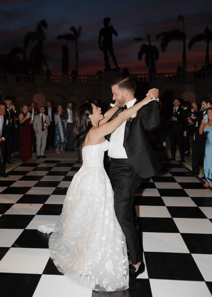 bride and groom share their first dance