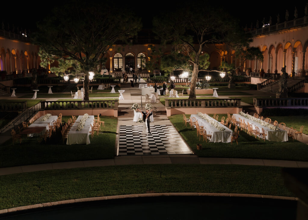 bride and groom share a private last dance in the middle of the Ringling courtyard