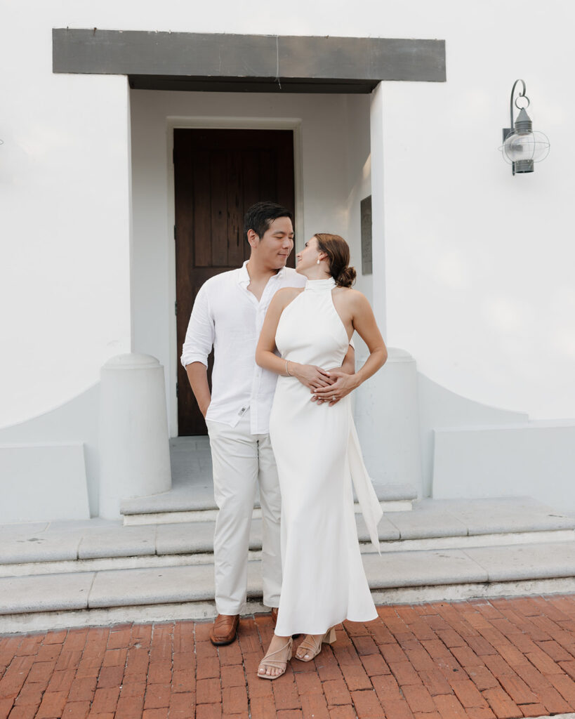 man and woman pose by Rosemary Beach