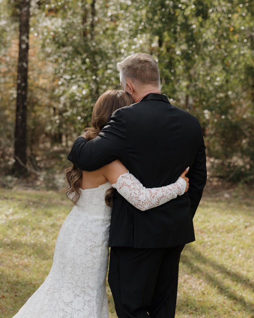 father and daughter hug