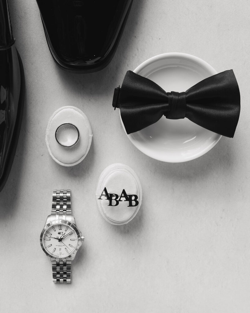 groom's bow tie, ring, and watch