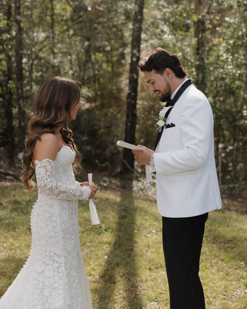 bride and groom read vows