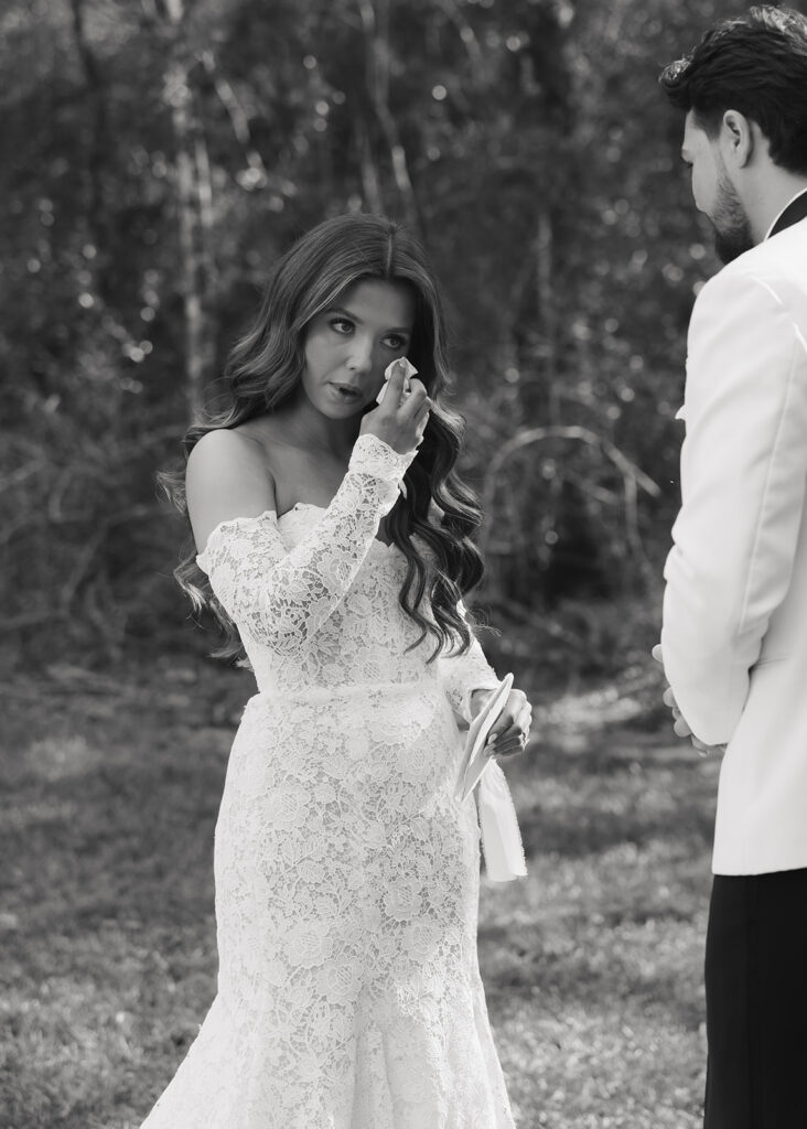 bride wipes her tears