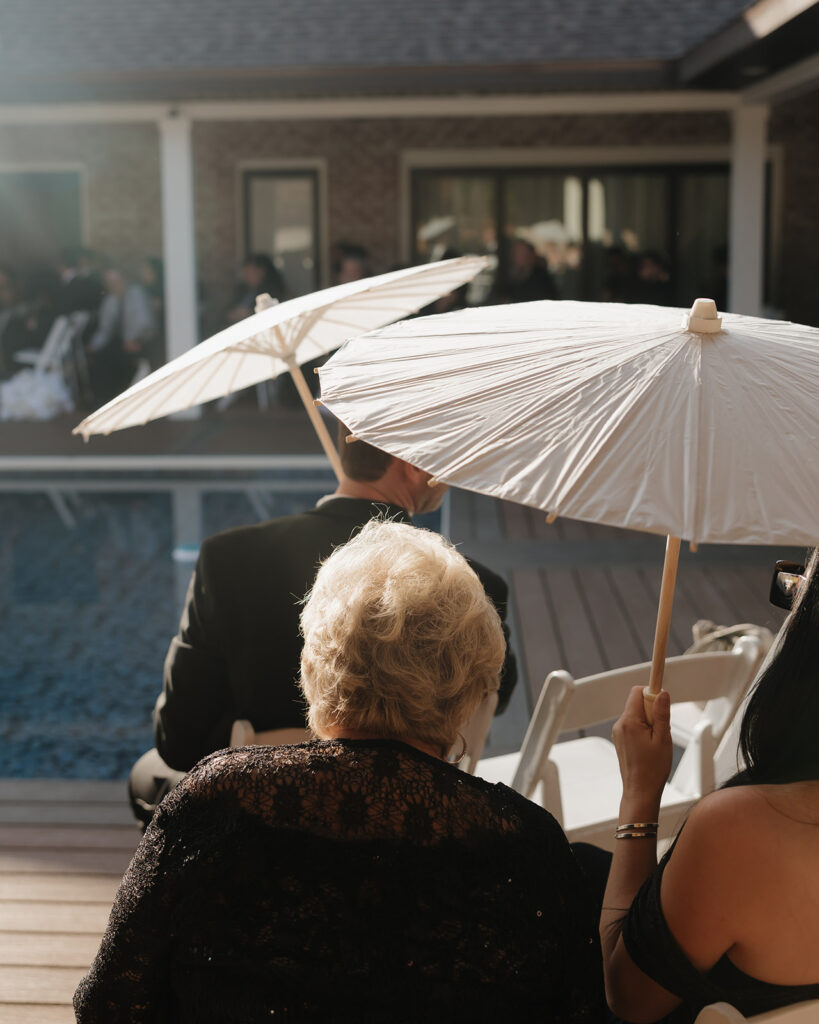 guests use umbrellas