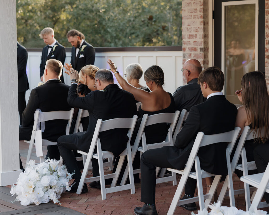 wedding guests pray