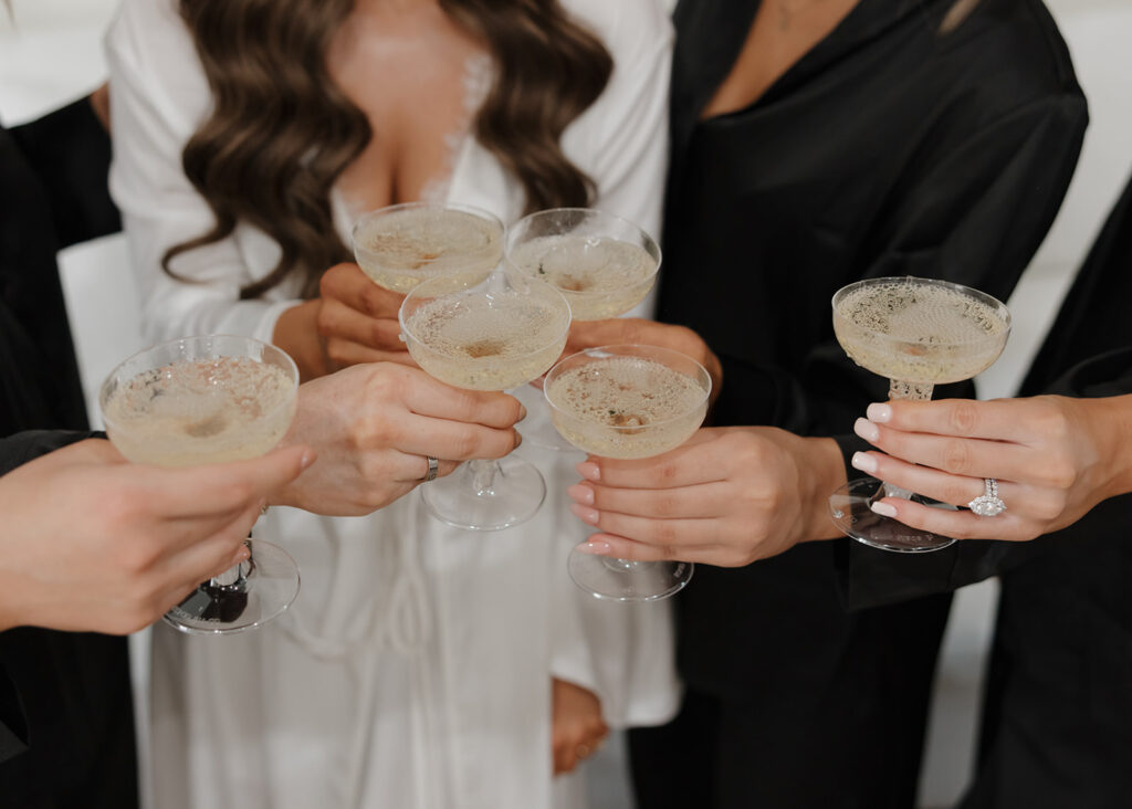 bride and bridesmaids cheer