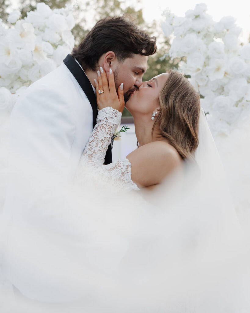 bride kisses groom