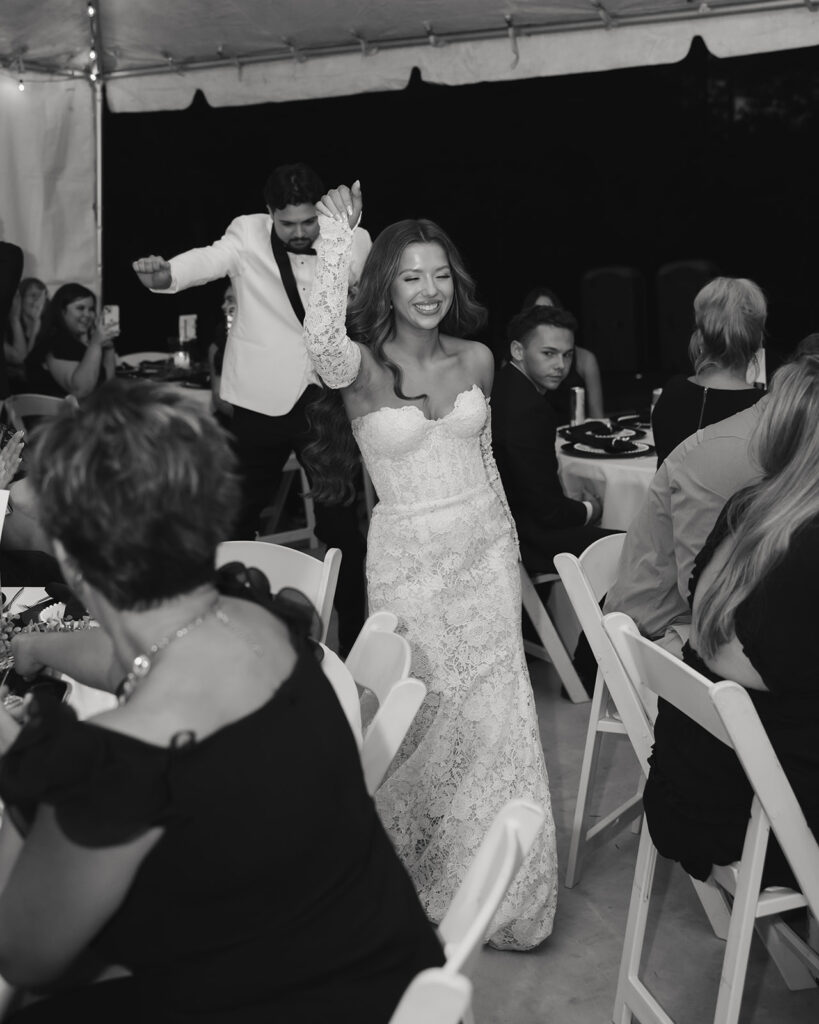 bride and groom enter reception