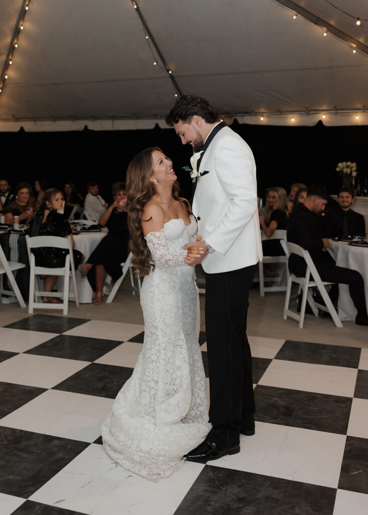 bride and groom dance together