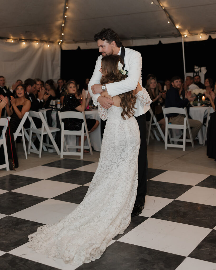 bride and groom dance together