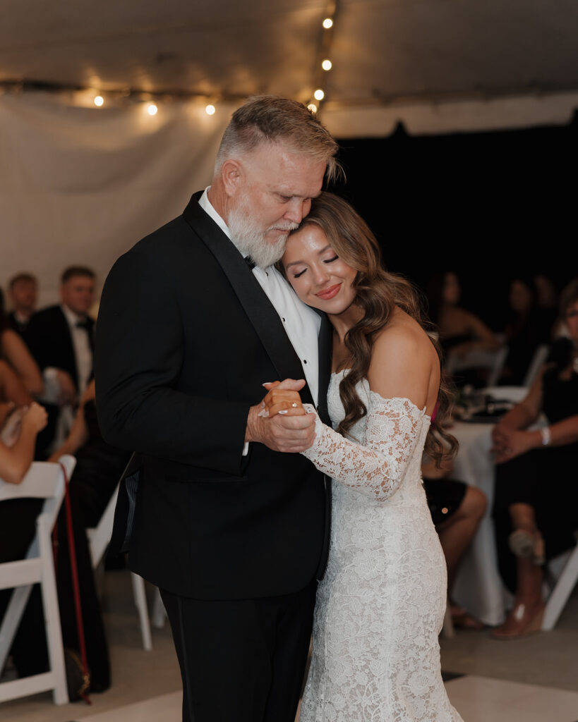 bride dances with father