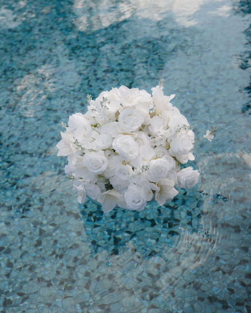 floating floral arrangement in the pool