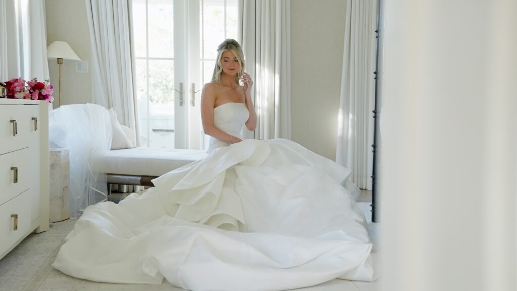 bride sits and plays with her hair