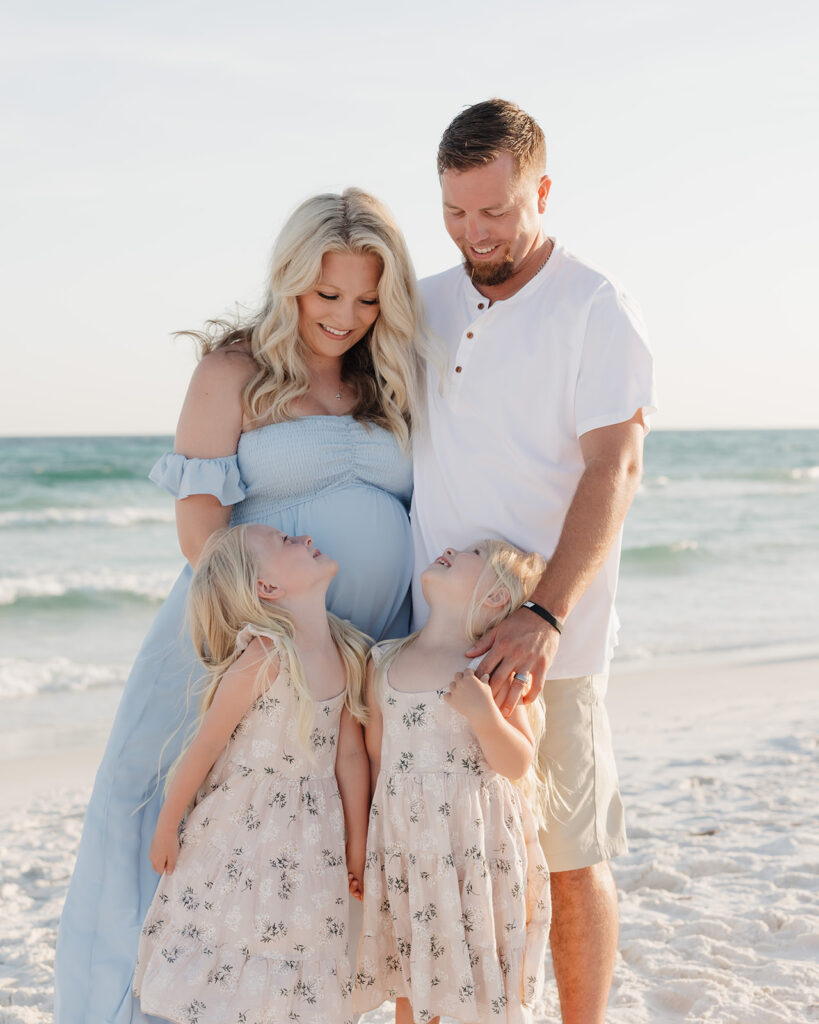 family of four plays on Santa Rosa Beach