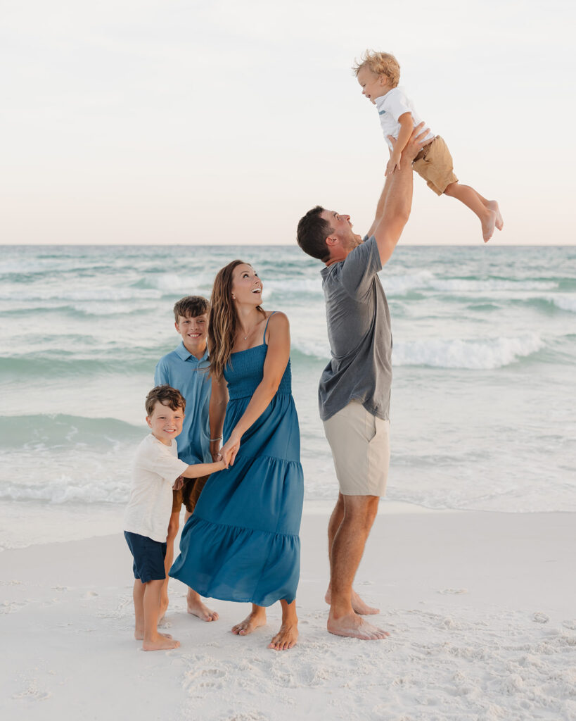 family of five plays on Santa Rosa beach