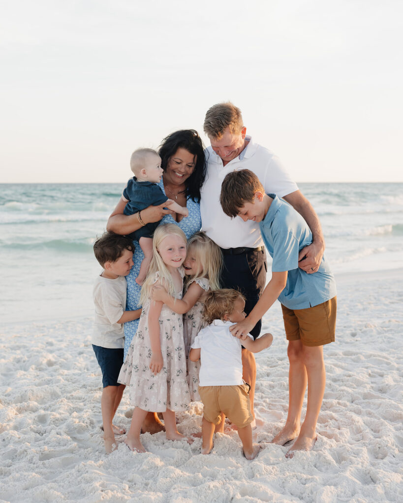 grandparents hug their grandchildren in Seaside Florida