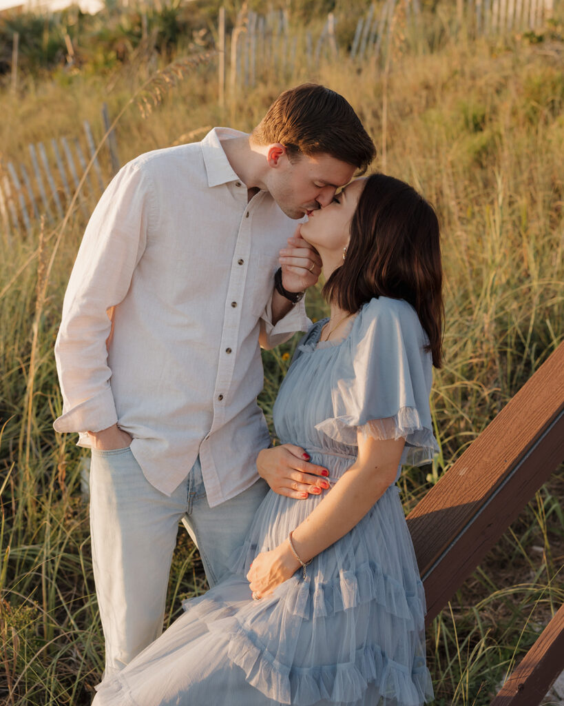 man kisses woman