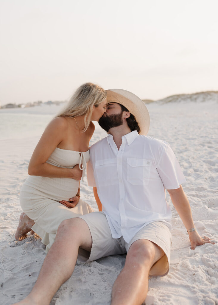 woman leans over to kiss man