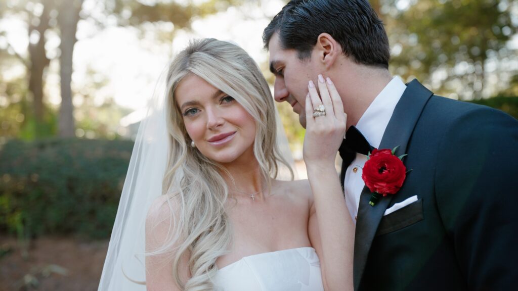 Groom kisses his bride