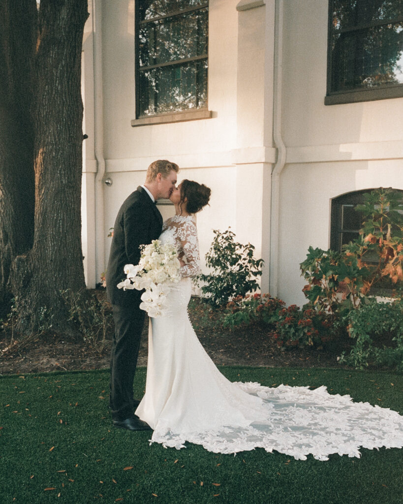 bride and groom kiss