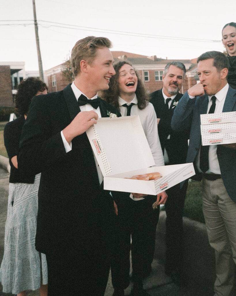 groom eats donuts