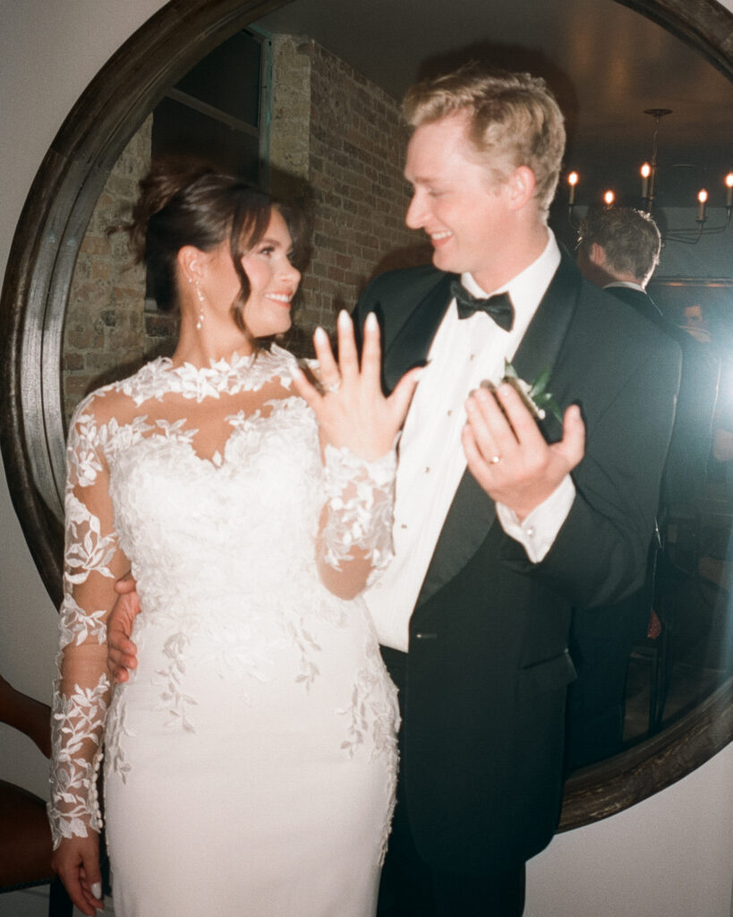 bride and groom smile