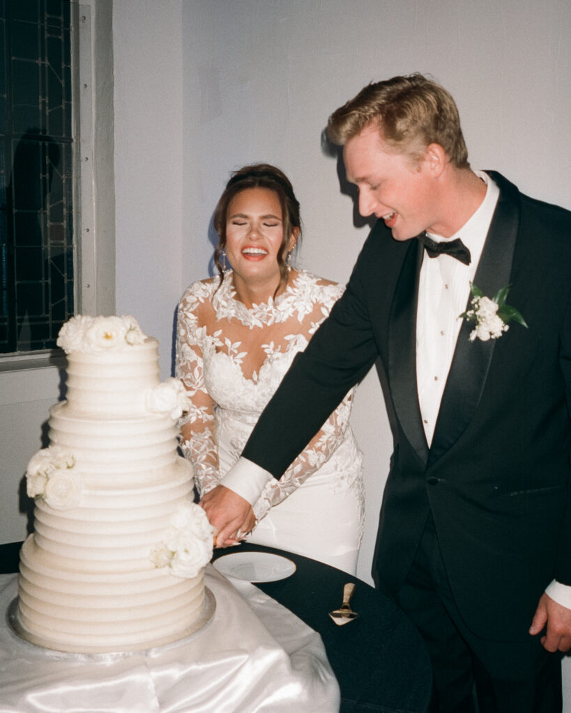 bride and groom eat cake