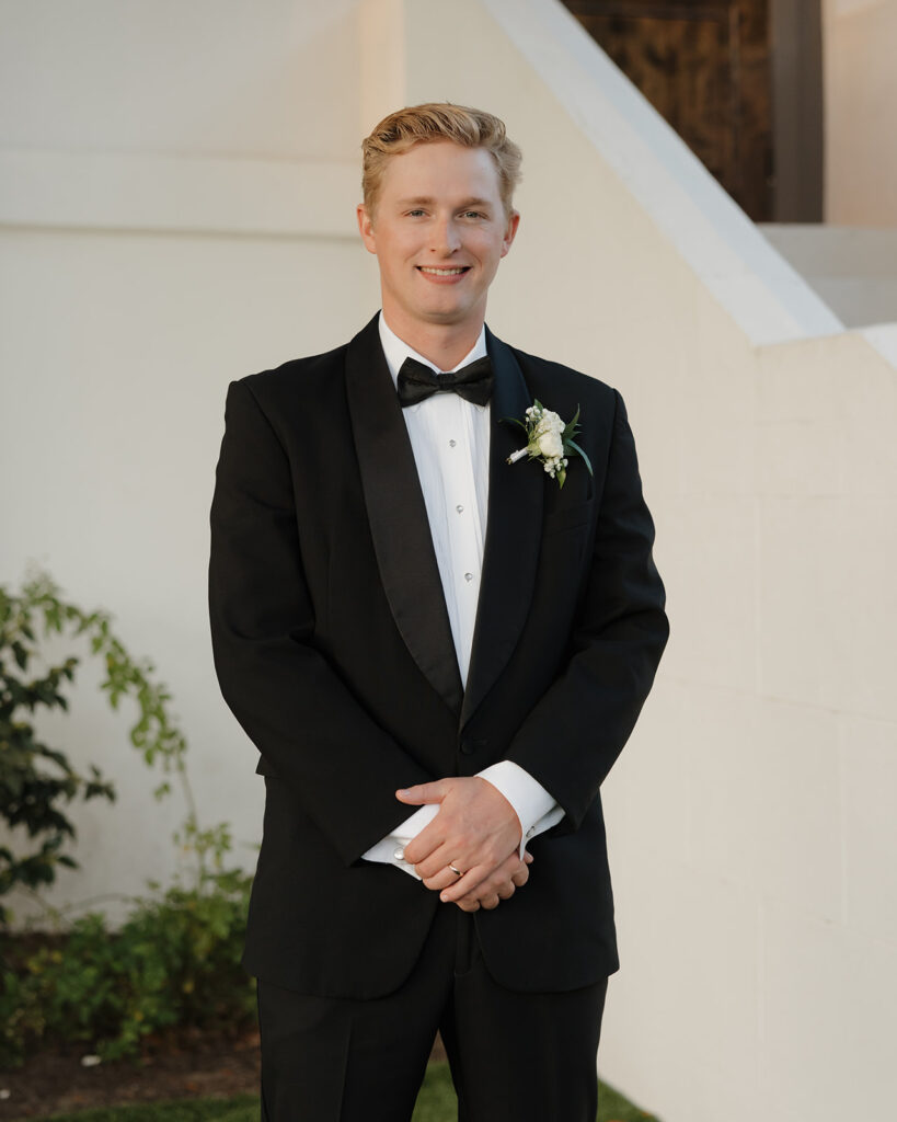 groom smiles