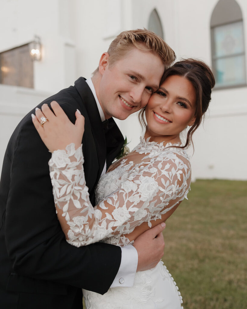 bride and groom smile