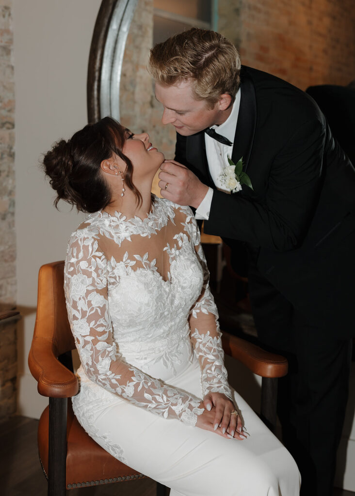 groom kisses woman