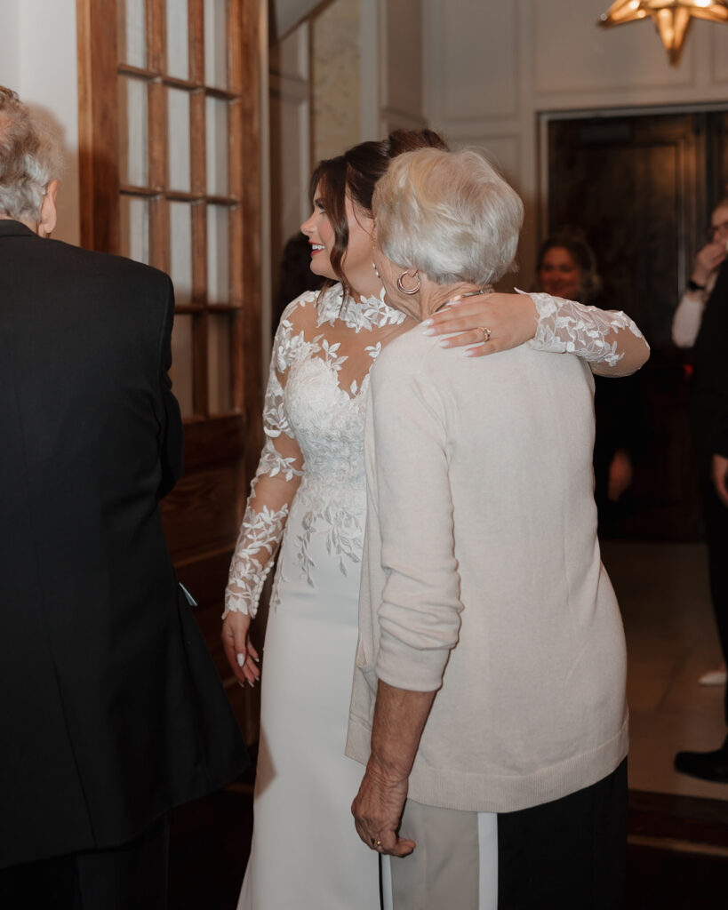 bride hugs grandma