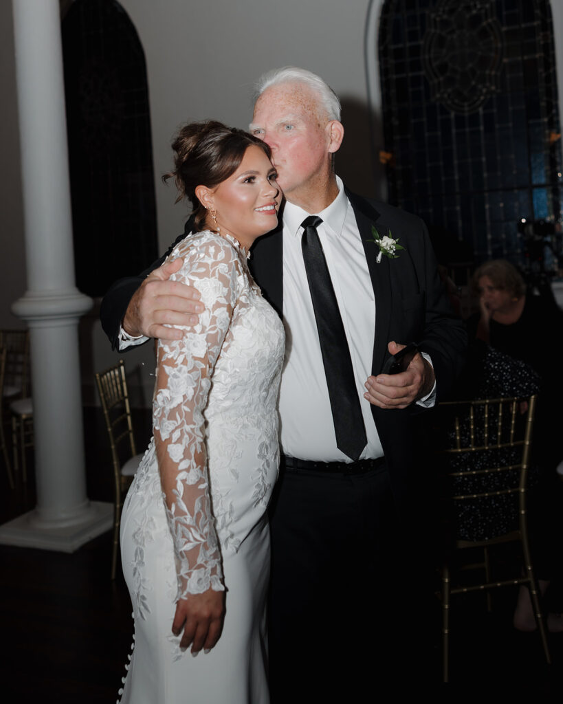 grandpa hugs bride