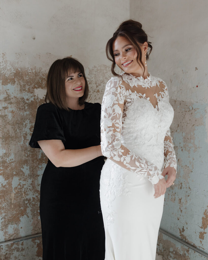 mother smiles at the bride