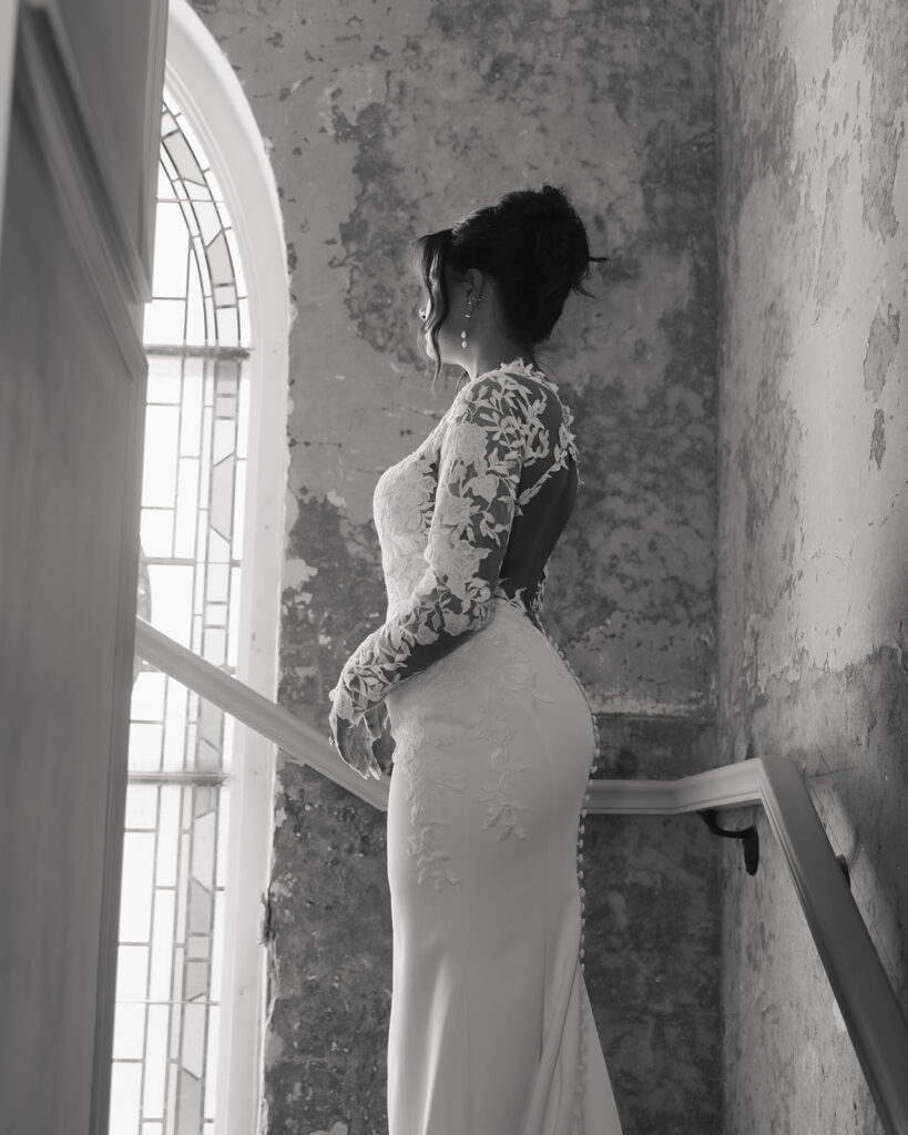 bride looks out the window