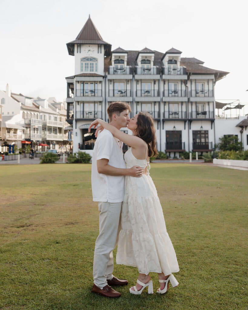 man and woman kiss on the Western green at Rosemary Beach