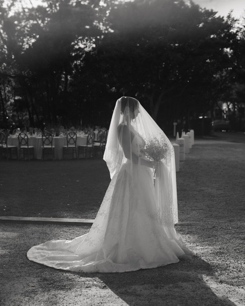 bride holds wedding bouquet of flowers