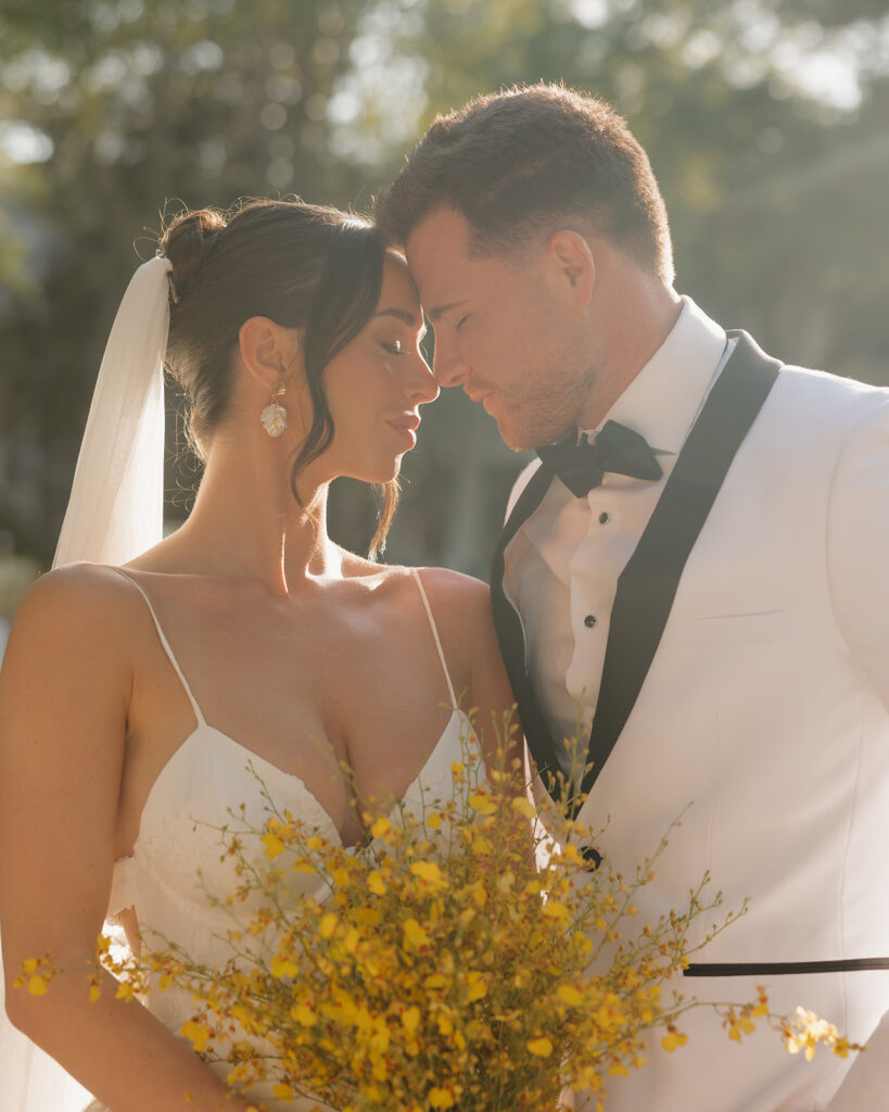 bride and groom kiss at the Seaside chapel