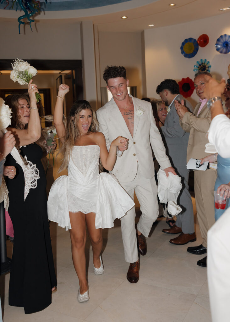 bride and groom exit the reception