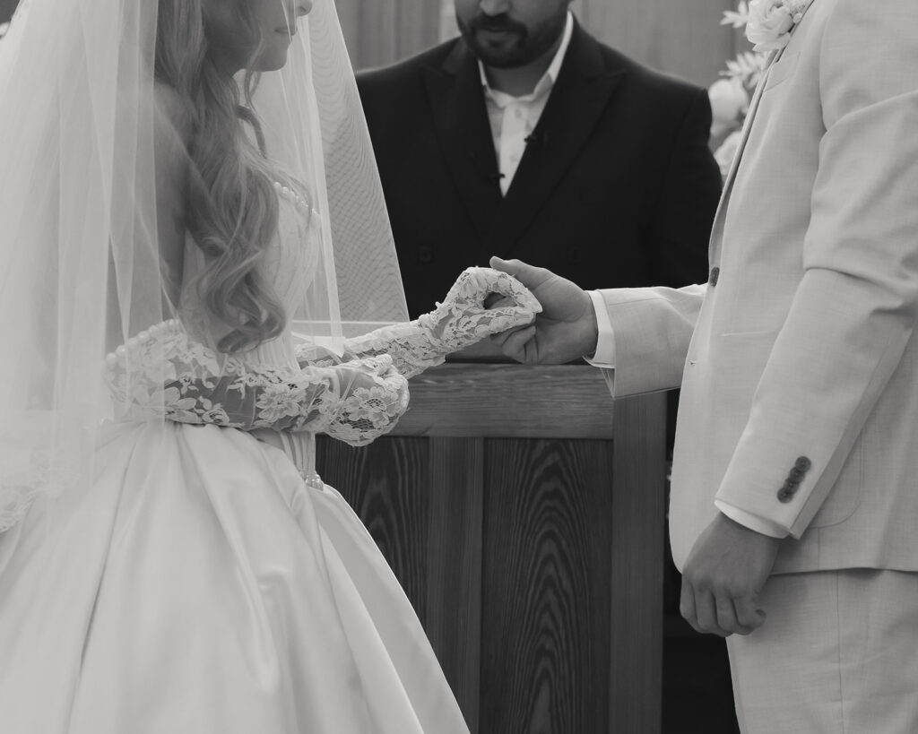 bride and groom exchange rings