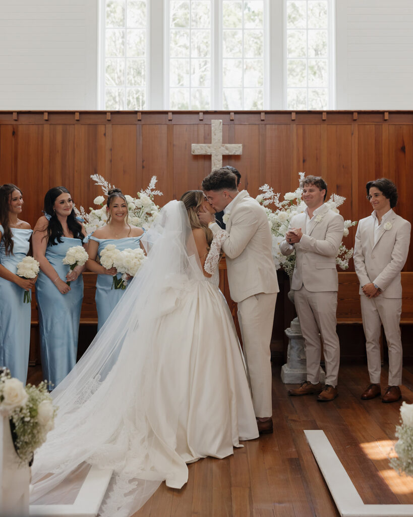 bride and groom kiss in the Seaside Chapel in 30A Florida